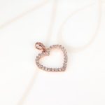 DIJE RECUBRIMIENTO DE ORO ROSA SILUETA CORAZON ZIRCONIA