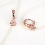 HUGGIES RECUBRIMIENTO DE ORO ROSA FLOR COLGADA ZIRCONIA