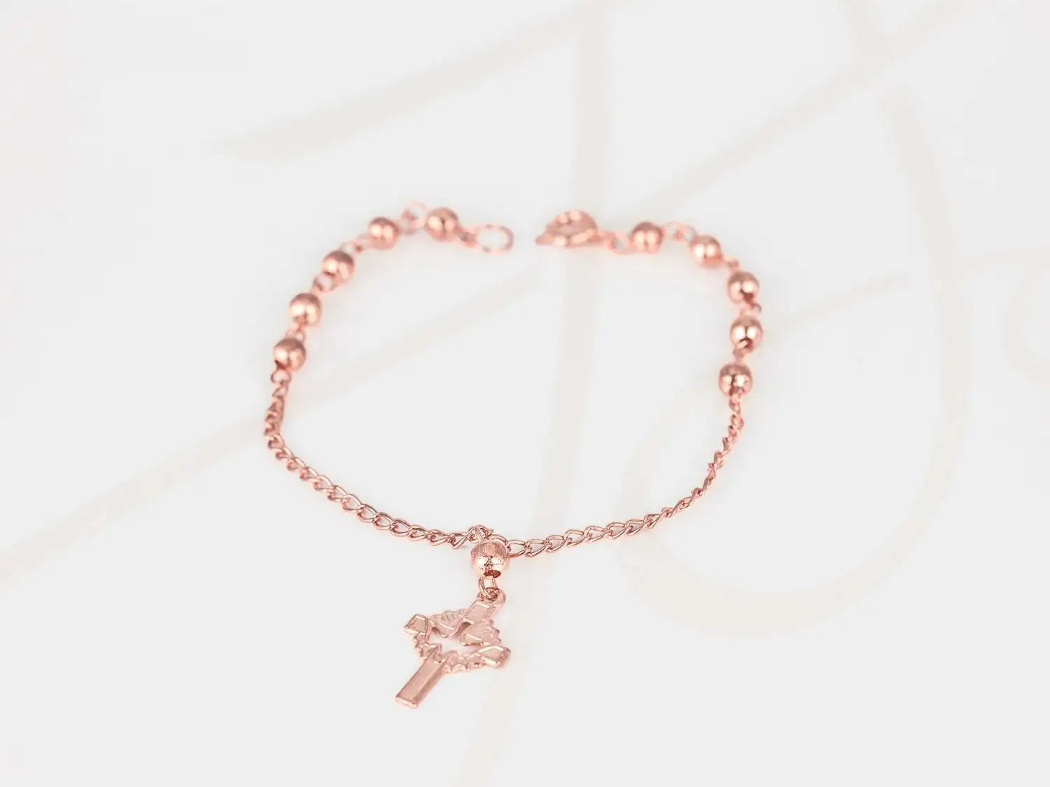 PULSERA CON DIJE RECUBRIMIENTO DE ORO ROSA MISTERIO CHICO LISO