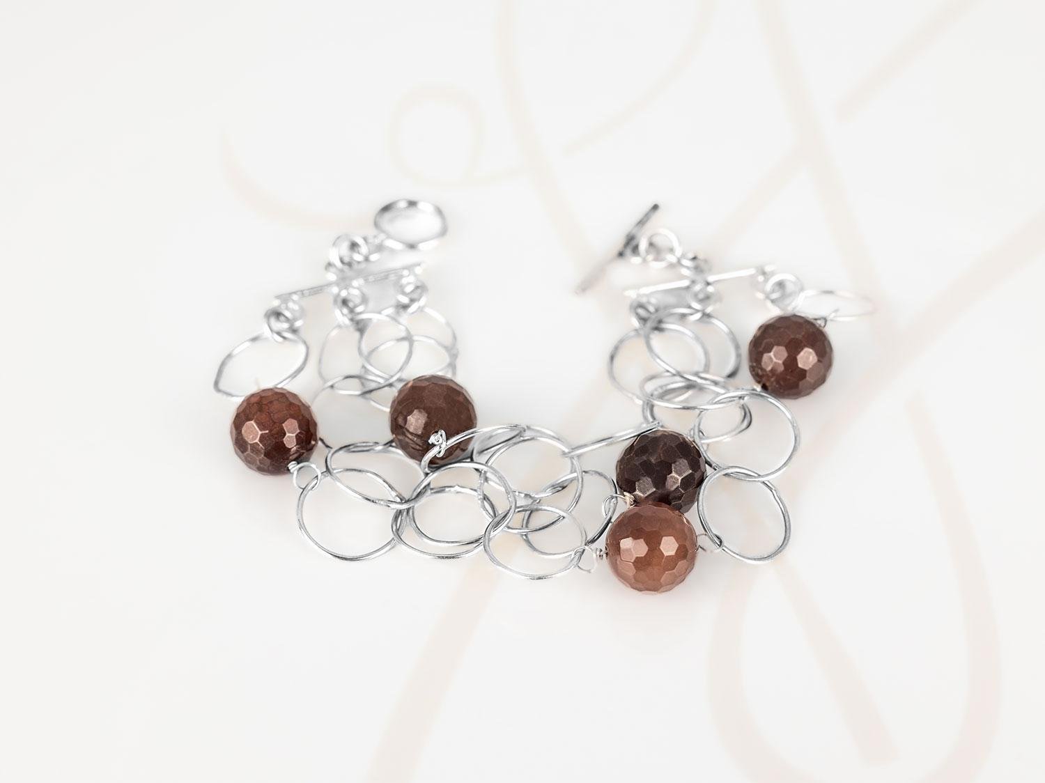 PULSERA SIN DIJE RECUBRIMIENTO DE PLATA MULTIPLES AROS PIEDRA
