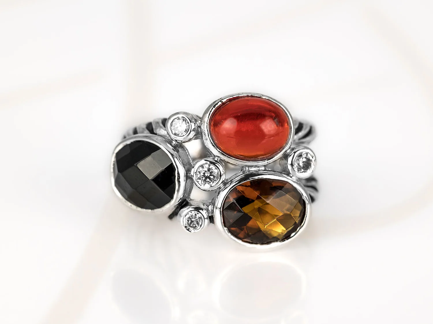 ANILLO RECUBRIMIENTO DE RODIO OVALOS PAVONADO CRISTAL