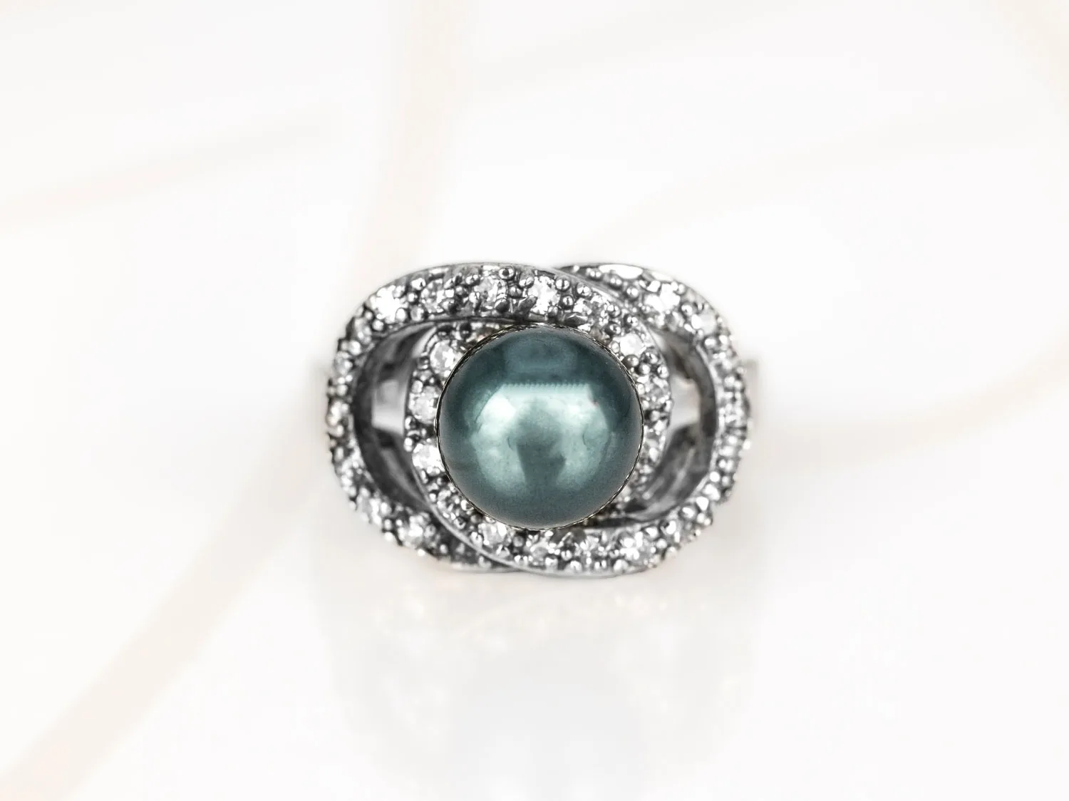 ANILLO RECUBRIMIENTO DE RODIO CIRCULOS ZIRCONIA PERLA